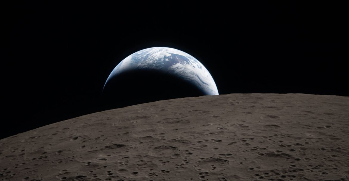 Moon and artemis questions Earthset captured through the Orion spacecraft window at 6:41 p.m. EDT, April 6, 2026, during the Artemis II crew’s flyby of the Moon. A muted blue Earth with bright white